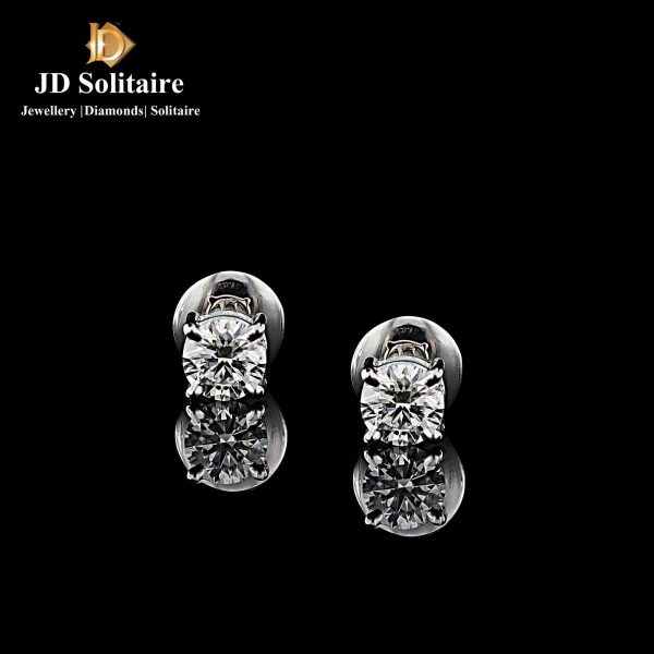 solitaire studs in white gold